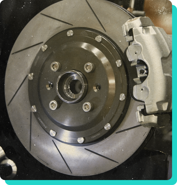 Close up image of a new set of brake pads and rotors in Wells, VT.