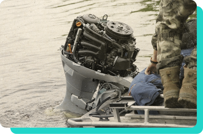 close up of fishing boat engine while in water