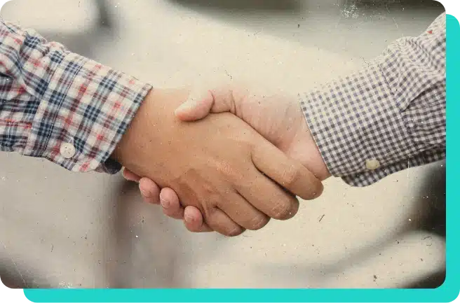 Trustworthy Auto repair in Wells, VT with Thomas' Auto Repair shop. Image of 2 male hands with button up shirts shaking hands.